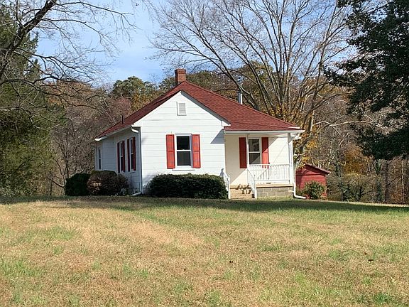 850 SF country cottage, built in early 1900s, completely renovated inside and out.