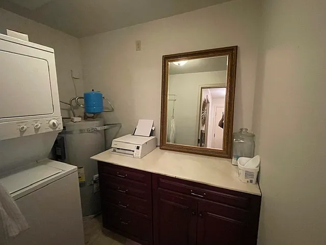 Laundry room with storage cabinet