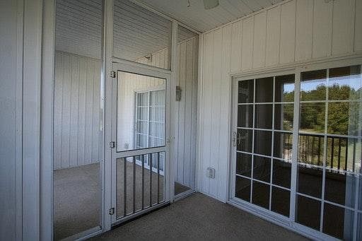 Screened in patio outside living room and open patio outside 4th bedroom