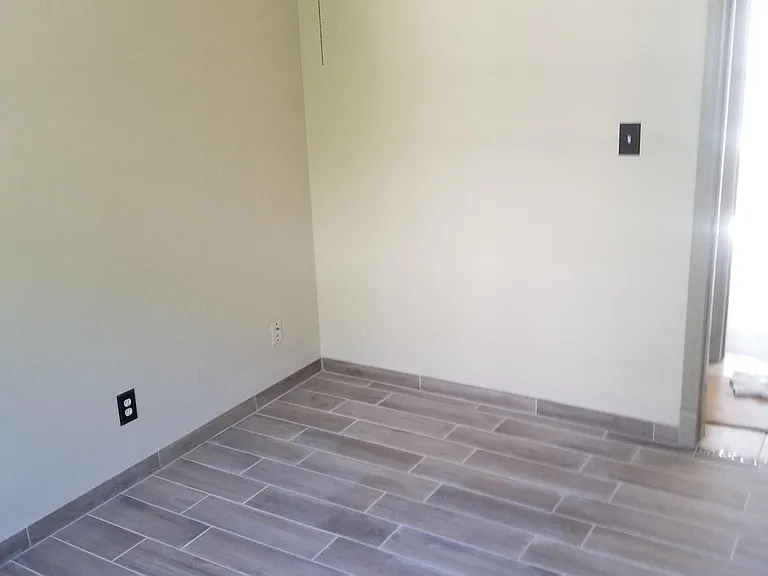 2nd bedroom. Newly tiled!