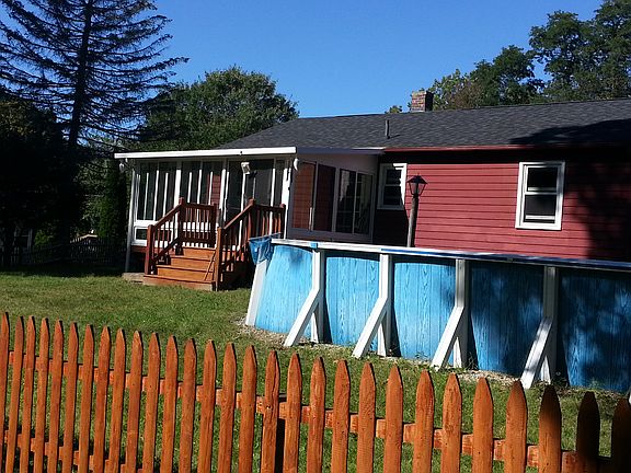 fenced yard, pool, sunroom