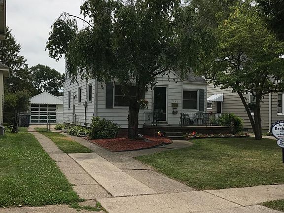 Cute yard. One car detached garage