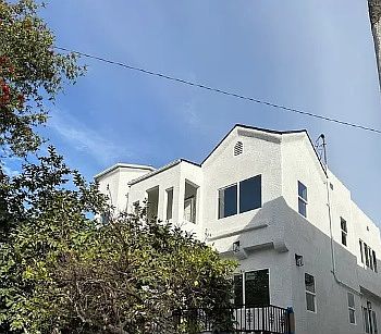 Outside view. Newly renovated exterior. All new windows.