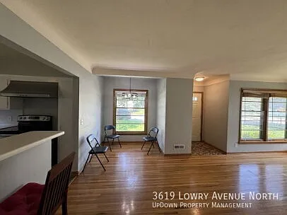 "Charming 3-Bedroom Home with Gleaming Hardwood Floors and 2 Full Baths in Robbinsdale!" — Photo 2