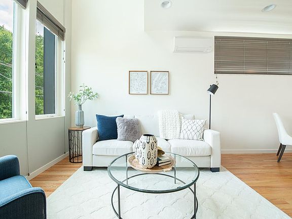 Lofted ceiling in living room (open to lofted Master above)