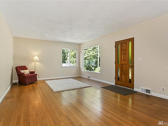 Enter into the spacious living room. 