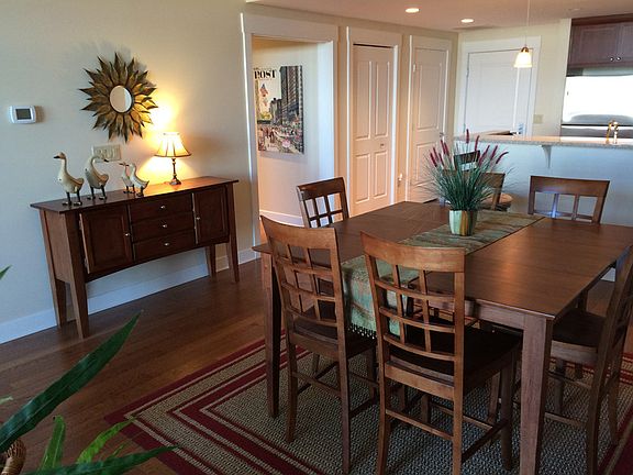 Laundry with full size stack-able washer and dryer are hidde