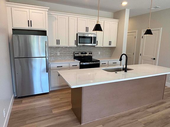 Open kitchen with quartz countertops