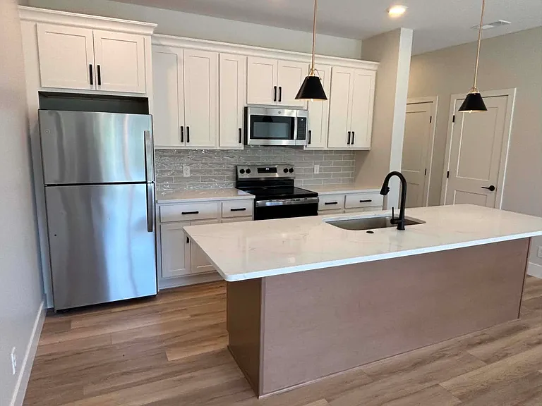 Open kitchen with quartz countertops