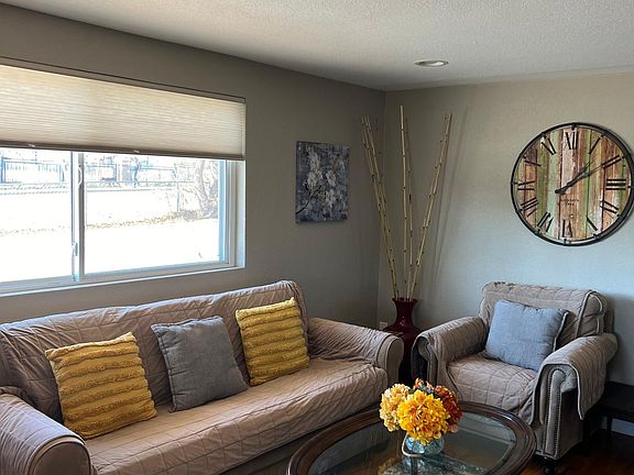Cozy and spacious living room (furniture covers can be removed)