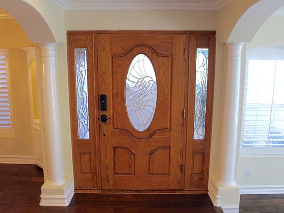 Front door entry leads to center foyer