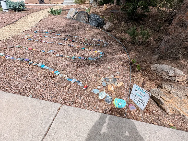 "Celia" the painted rock snake has become a neighborhood icon.
