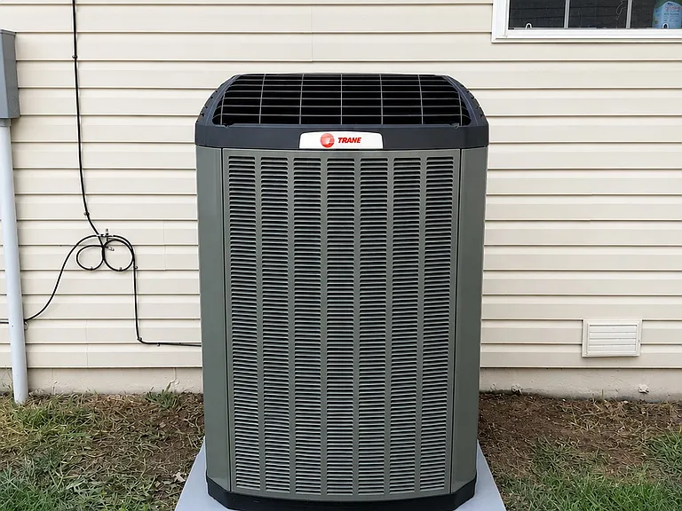 New High Efficiency AC Condenser (Trane). Helps on electric bill.