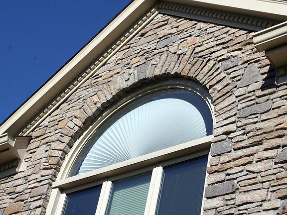 arched window in bedroom