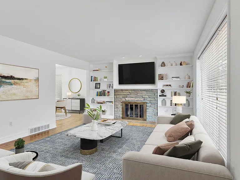 Large living area open to dining with huge front window - allowing tons of daylight!