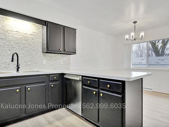 Kitchen adjoins dining room