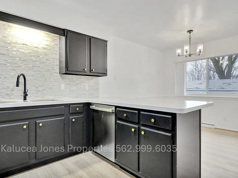 Kitchen adjoins dining room
