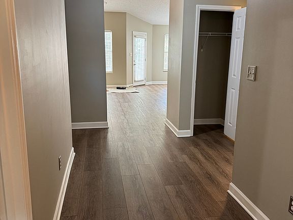 Hall way into condo