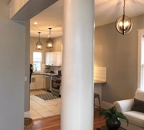 View from the entry with original decorative pillar