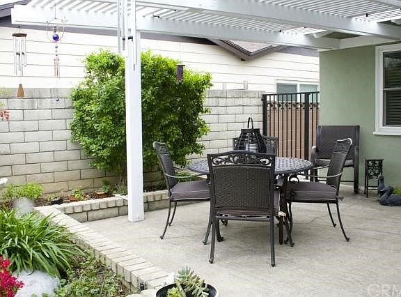 You could add a slider to provide direct access to patio from the master bedroom.