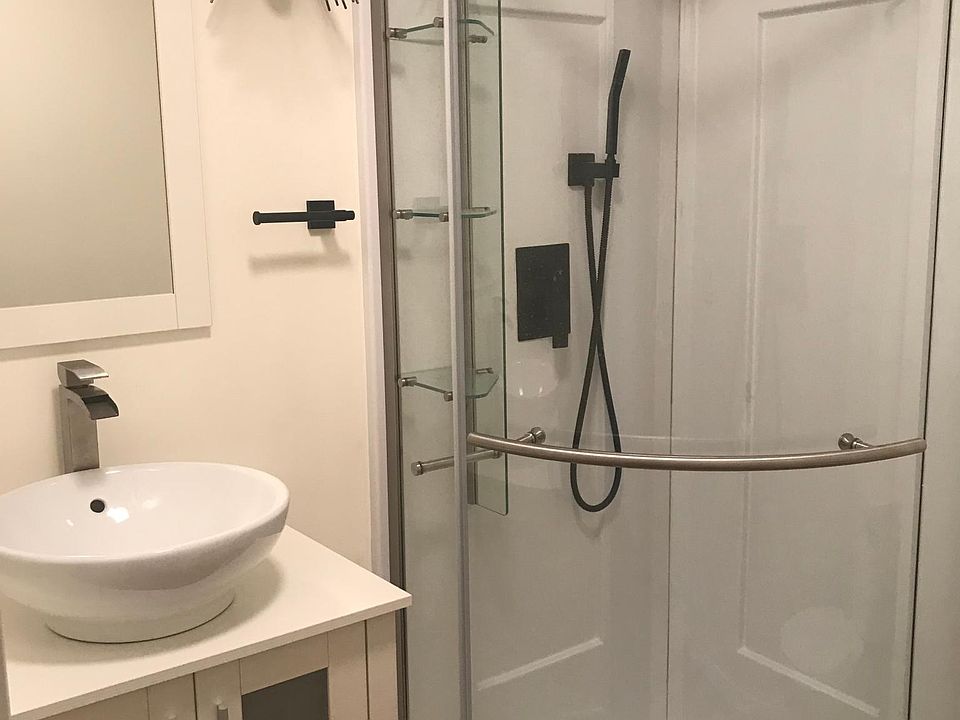 Brand new bathroom with dual shower head