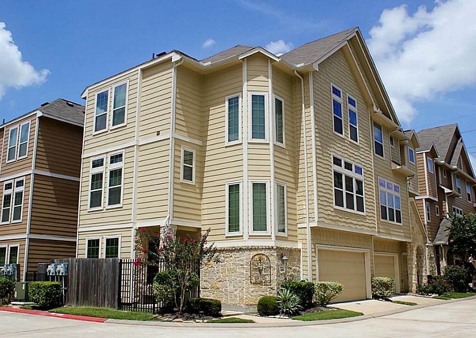 Charming corner townhome in the desirable gated community of Dominion Estates!