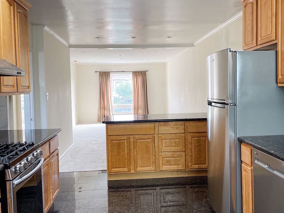 view of kitchen to living room open space - pretty big