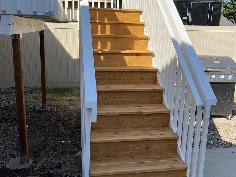 Elevated private deck with access to fully-fenced backyard with lawn, patio and BBQ. Brand new in Oct '22.