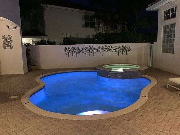 Heated Pool & Waterfall Spa.