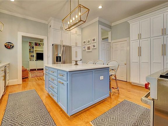 Amazing cabinet space and pantry, new wood floors, counter space is wonderful!