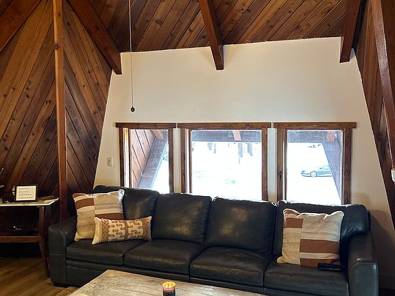 Luxurious leather sofa for movie night or relaxing after a day on the slopes!