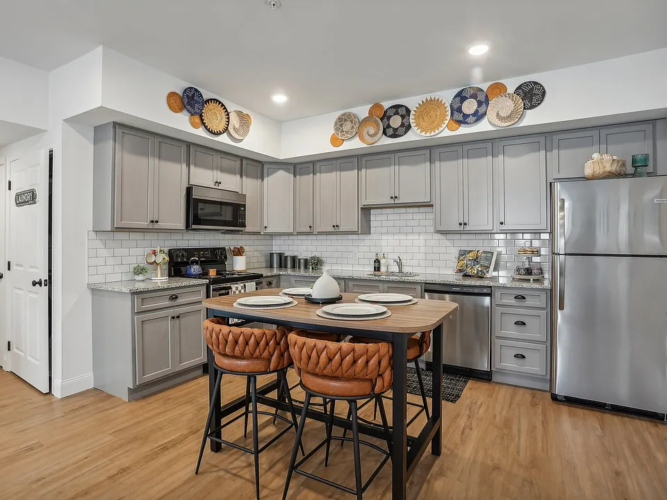 Designer Custom Kitchens with Granite Counters, Subway Tile and Stainless Steel Appliances