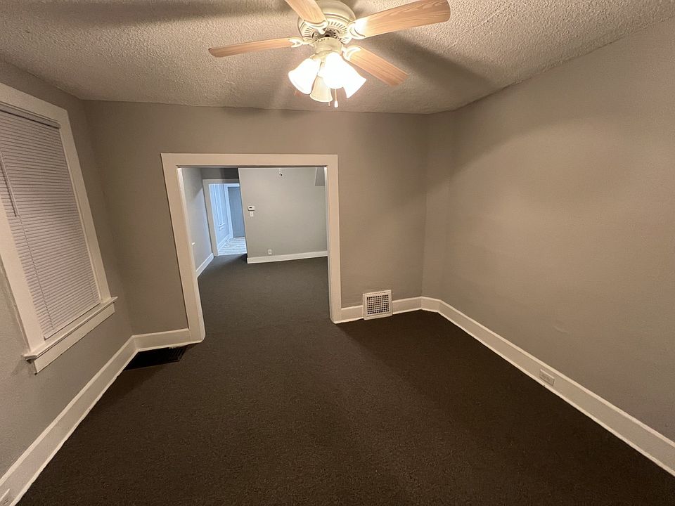 looking into second room, kitchen entry far left corner