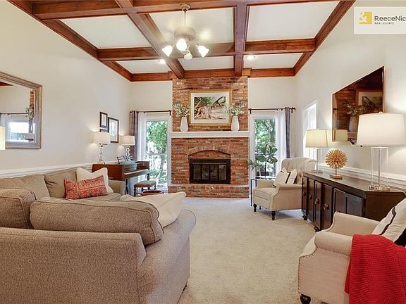 A warm and spacious great room, right off kitchen.