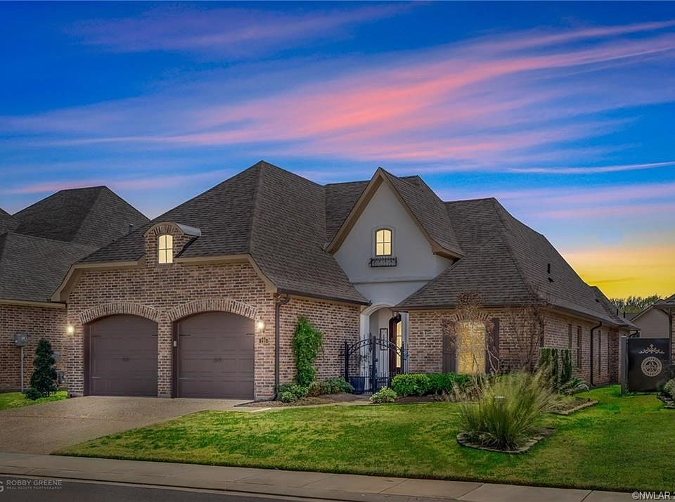 Beautiful curb appeal is just the beginning of the charm and beauty at 215 Jasmine Walk.