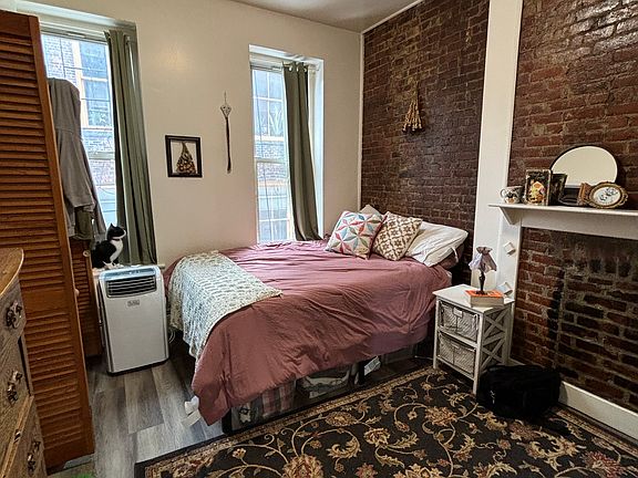 bedroom with a Full size bed (but the room can easily fit a queen bed, & possibly a king). **apartment delivered vacant/unfurnished!!