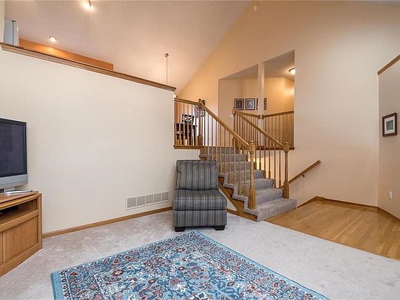Living room is open to Kitchen & Dining areas.