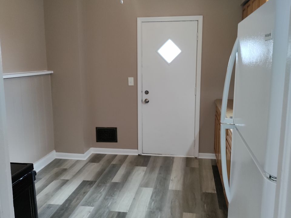 Back door entrance to kitchen from parking spot