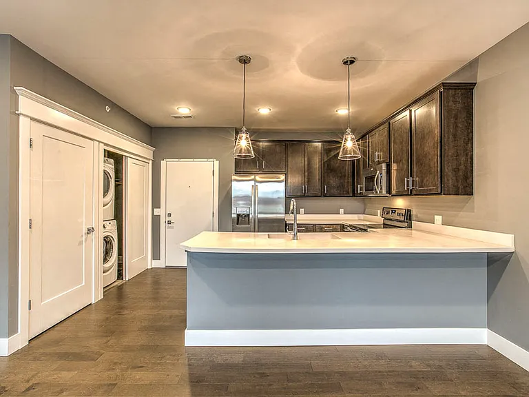 Open-concept layouts seamlessly connect the kitchen and living space, making it easy to cook, dine, and unwind in style.