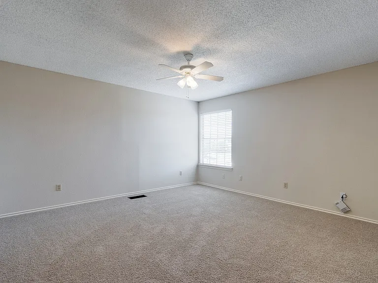 This bedroom is on the top floor and it is so large it can be used as an office or a media room. It has a large walk in closet.