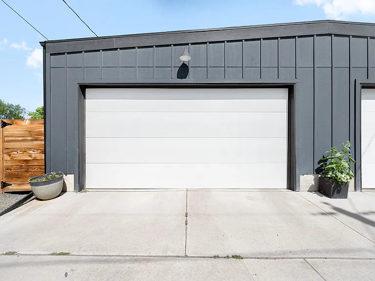 2 car garage with large storage shelf