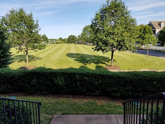 Townhome overlooks large non-developable common field