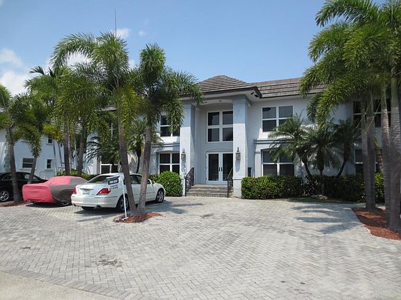 Front of Building, with Reserved Parking Area for up to 4 Ve