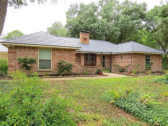  Lovely home on 2 acres in quiet Bob Cat Trail. Tomball schools!