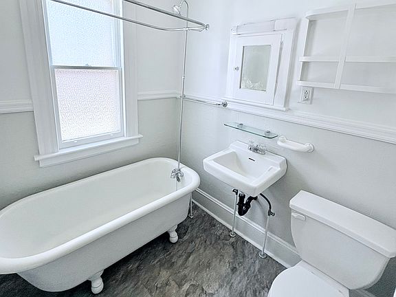 New Tiled Floor and freshly painted walls and ceiling/trims.