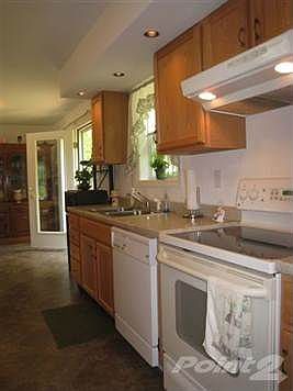 Kitchen is open to dining area