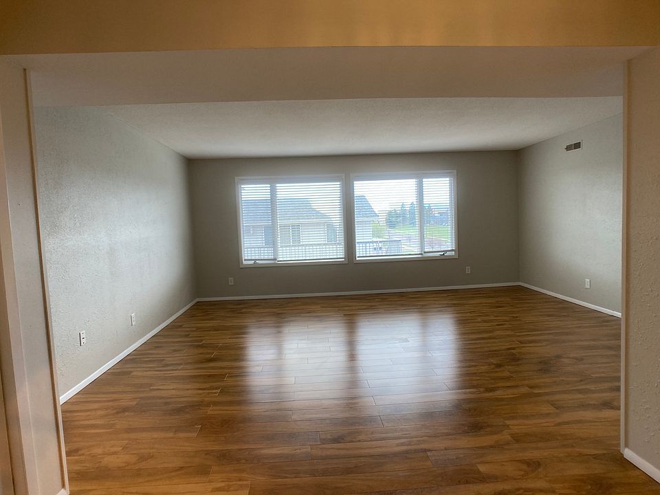 Spacious living area with lots of natural light.