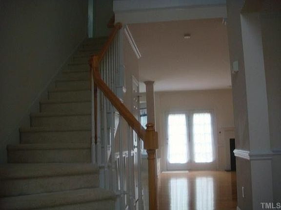Entry Way with Gleaming Hardwood Floors