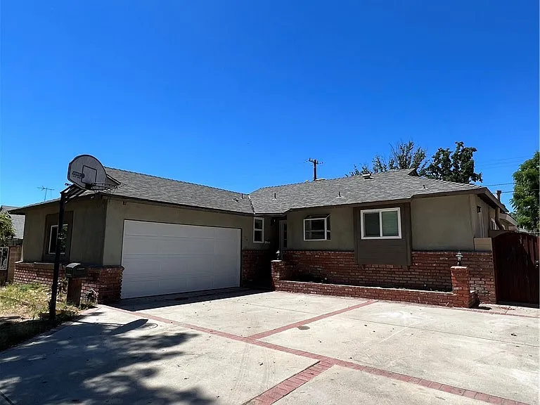 7657 Teesdale Ave — Photo 1