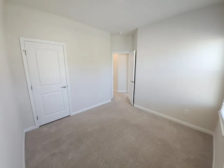 FIRST ROOM WITH CLOSET AND TWO WINDOWS